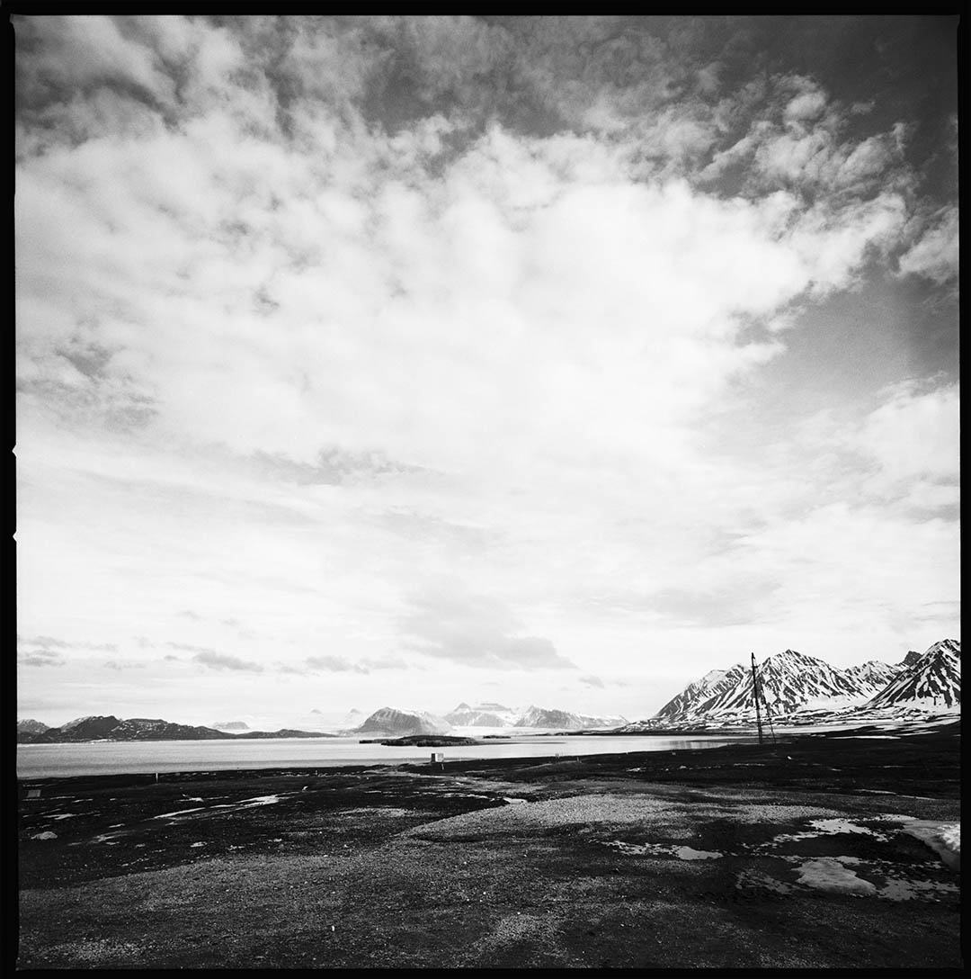 "Glacier & historic mast for North Pole dirigeable", Ny Alesund, Spitzberg Island, Northest Artic Village, © Loïc Dorez.